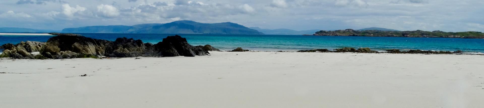 https://www.selectscotlandtours.com/web/datafiles/uploaded/cms_banner/main/main_159_Traigh Ban Nam Monach the White Strand of the Monks.jpg